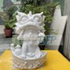 tượng thạch cao mèo đội đầu lân
